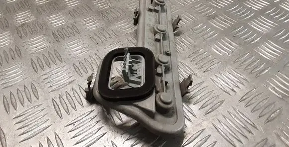 Tail light bulb cover holder