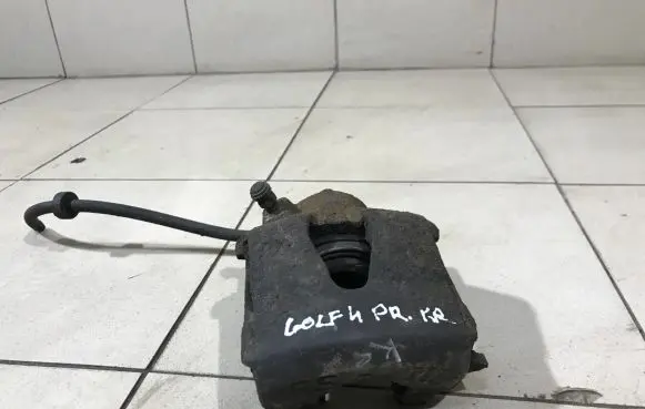 Volkswagen Golf IV Front brake caliper