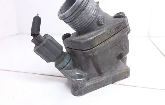Thermostat/thermostat housing