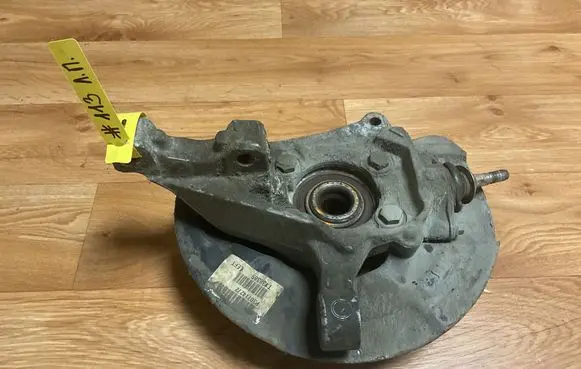 Front wheel hub spindle knuckle