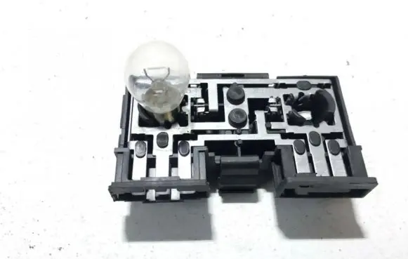 Volkswagen PASSAT B3 Tail light bulb cover holder 321945259