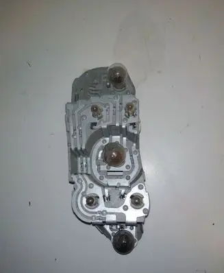 Toyota Corolla Verso E121 Tail light bulb cover holder