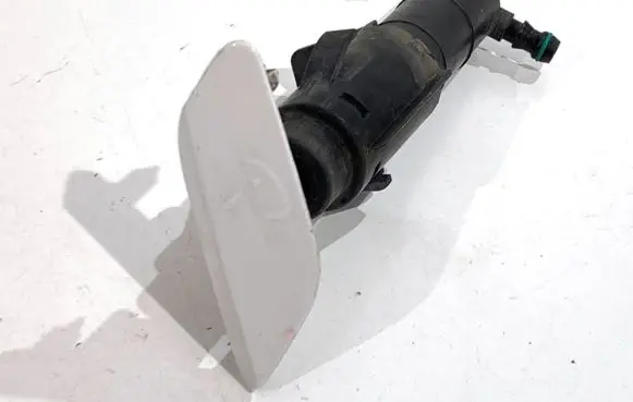 Volkswagen Jetta VI Headlight washer spray nozzle 5K0955978A