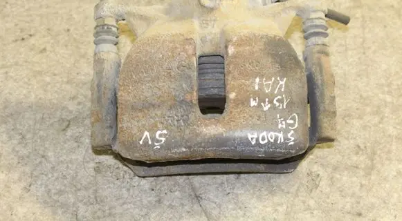 Volkswagen Golf VII Front brake caliper