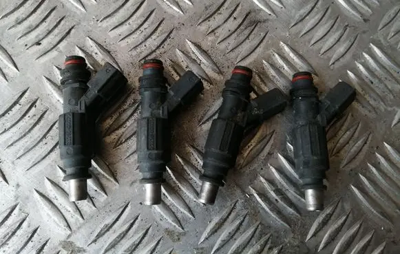 Toyota Corolla E120 E130 Fuel injectors set 232500D020 0280155936