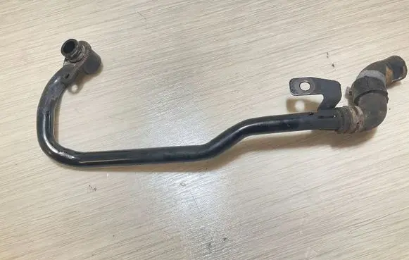 Volkswagen Golf VII Engine coolant pipe/hose 04L121065AJ