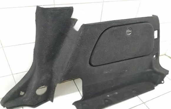 Trunk/boot lower side trim panel