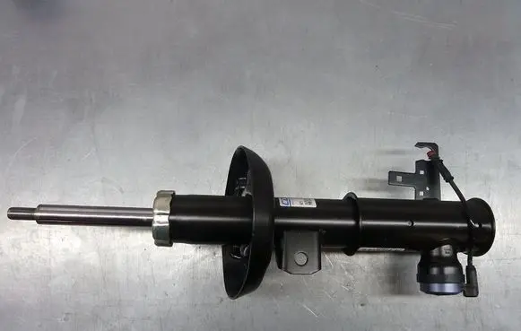 Opel Zafira C Front shock absorber/damper 13351214-T