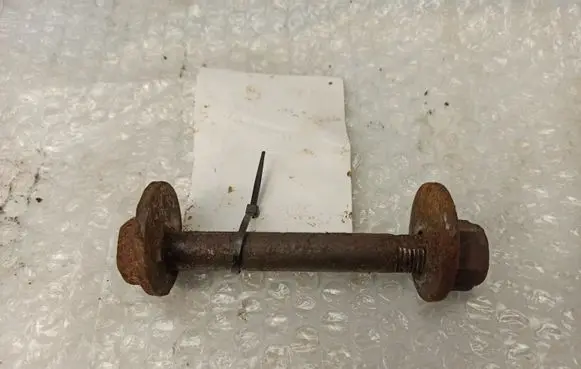 Front suspension camber bolt