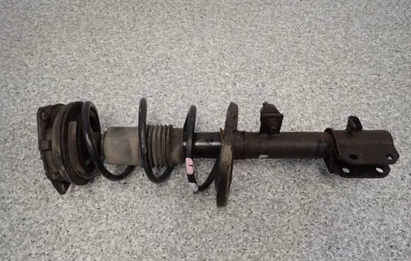 Nissan Micra Front shock absorber with coil spring