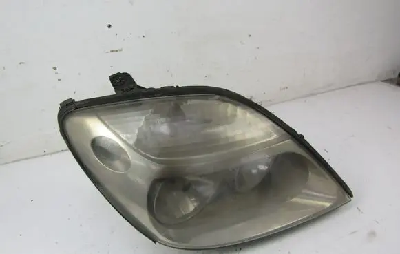Renault Scenic I Headlight/headlamp 7700432097