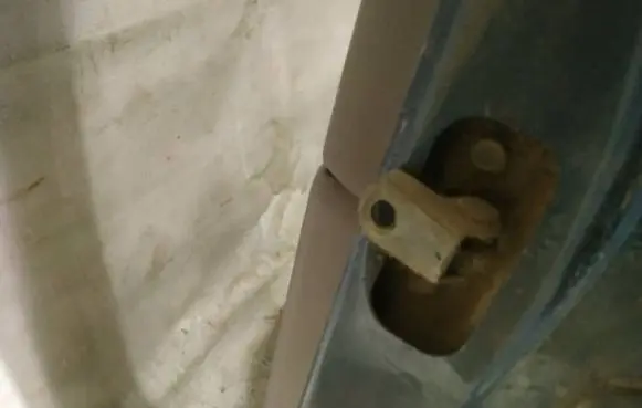 Rear door check strap stopper