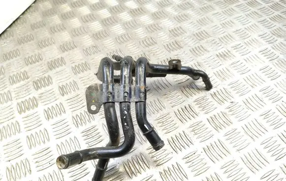Volkswagen PASSAT B8 Engine coolant pipe/hose 04L121064AC