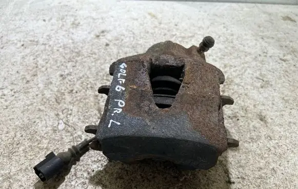 Volkswagen Golf VI Front brake caliper