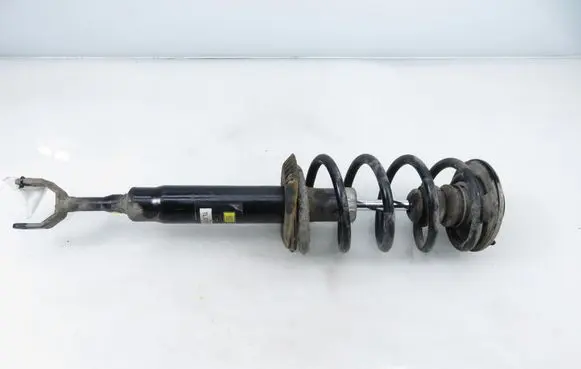 Volkswagen PASSAT B5 Front shock absorber with coil spring 