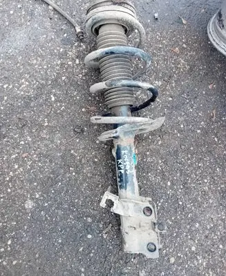 Renault Koleos I Front shock absorber with coil spring