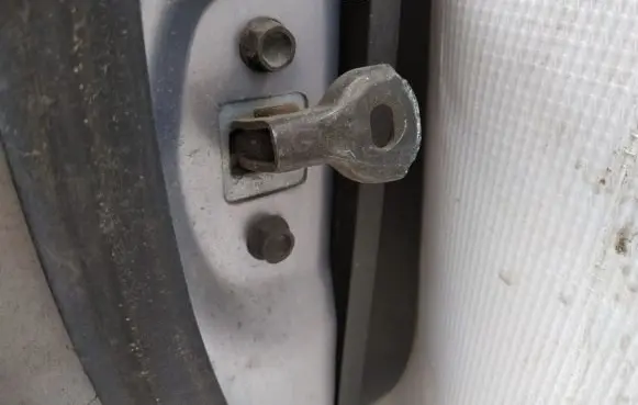Mazda CX-7 Rear door check strap stopper