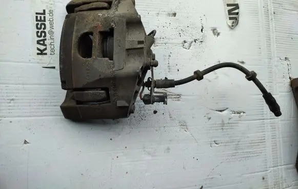 Audi A6 S6 C6 4F Front brake caliper 974