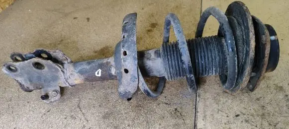 Front shock absorber with coil spring