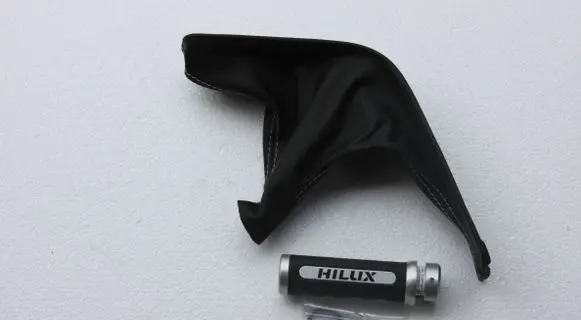 Toyota Hilux (AN120, AN130) Handbrake lever cover (leather/fabric) PW4660K002