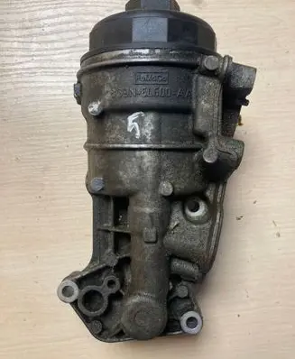 Volvo S80 Oil filter mounting bracket 8G9N6L600AA