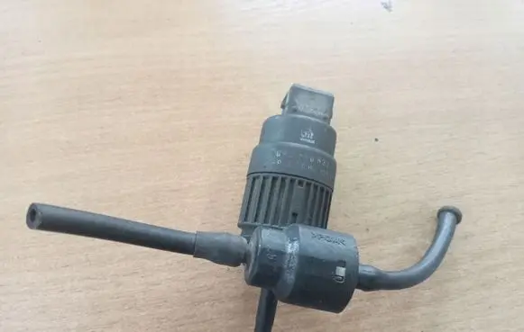 Opel Astra G Windscreen/windshield washer pump 1450185