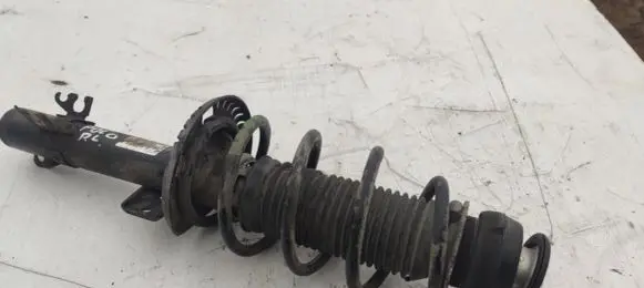 Volkswagen Polo V 6R Front shock absorber with coil spring 6RU413031B 6R0411105C
