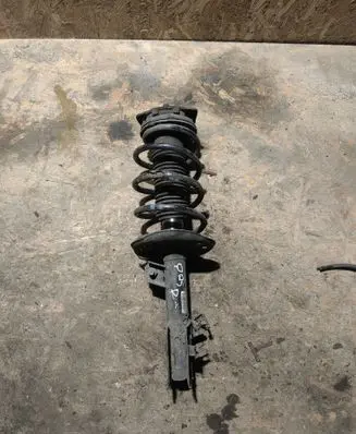 Nissan Qashqai Front shock absorber with coil spring 