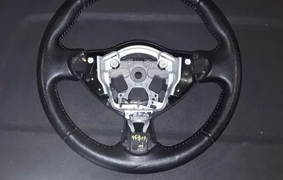 Nissan Juke I F15 Steering wheel 34126715A 34126712B