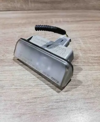 Toyota Avensis T250 Number plate light 48100 l07dot Koito
