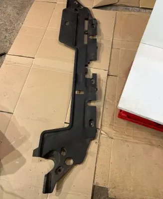 Engine bonnet/hood lock trim molding