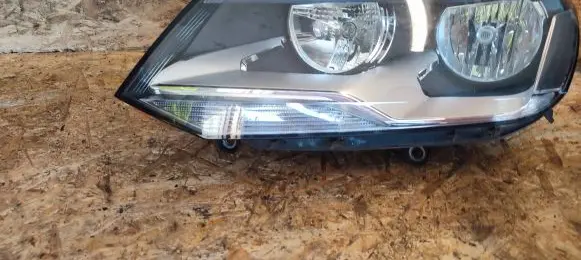 Volkswagen Touareg II Headlight/headlamp 1LJ01032823 7P2941005