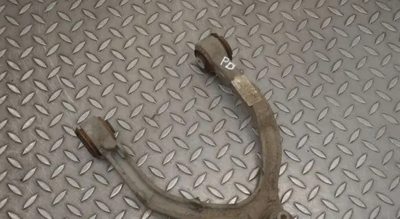 Tesla Model Y Front upper control arm/wishbone 77763