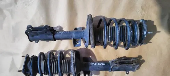 Ford Mustang V Front shock absorber with coil spring BR33-18045