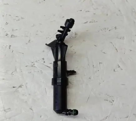 Volkswagen PASSAT CC Headlight washer spray nozzle 1307030666 3C8955103B
