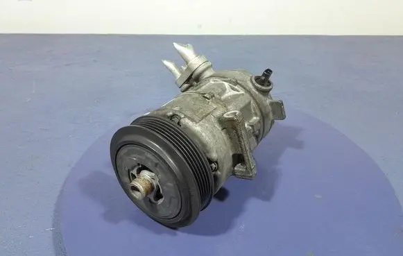Opel Corsa D Air conditioning (A/C) compressor (pump) 55701200