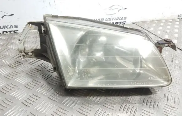Mazda 323 Headlight/headlamp SAEHR97 3161119R 10086
