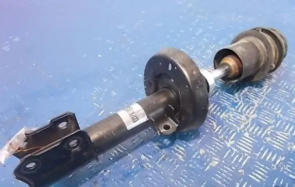 Opel Astra H Front shock absorber with coil spring