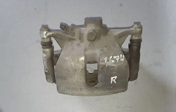 Volkswagen Tiguan Front brake caliper 3C0615124