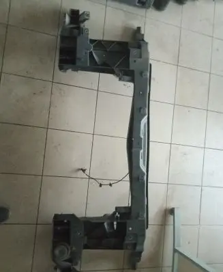 Top upper radiator support slam panel