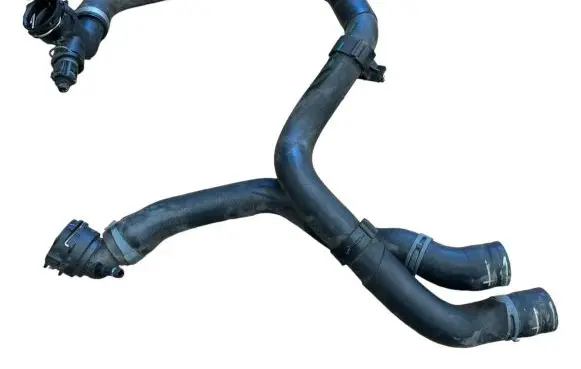 Volkswagen PASSAT B8 Engine coolant pipe/hose 5Q0121049AC