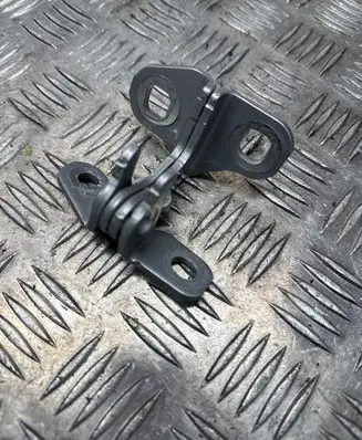 Rear door upper hinge