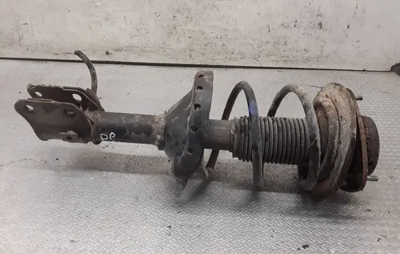 Subaru Legacy Front shock absorber with coil spring
