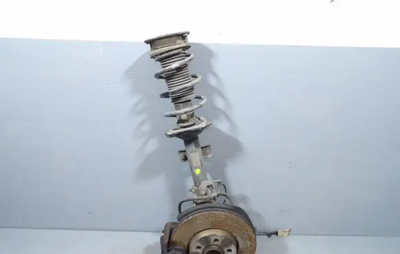 Cadillac Escalade Front shock absorber with coil spring