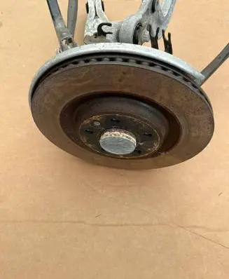 Rear wheel hub spindle/knuckle