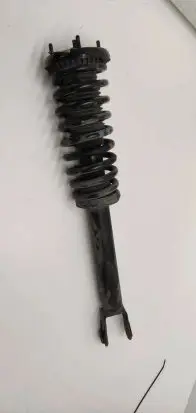 Jaguar XF Front shock absorber with coil spring
