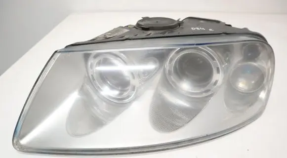 Volkswagen Touareg I Headlight/headlamp 7L6941017A