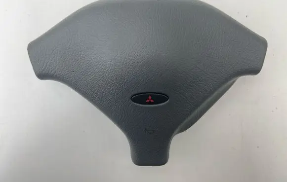 Mitsubishi Pajero Steering wheel trim MB864309