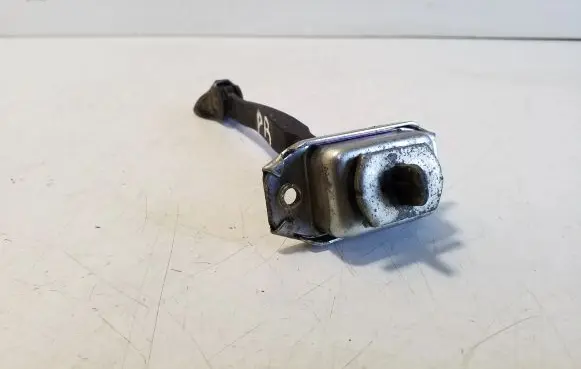 Front door check strap stopper