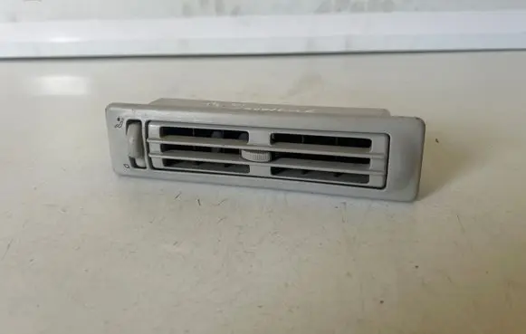 Volkswagen Multivan T4 Dash center air vent grill 703820963